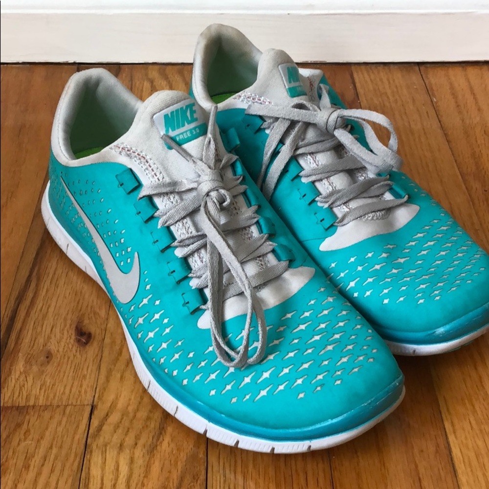 Teal Nike Free sneakers